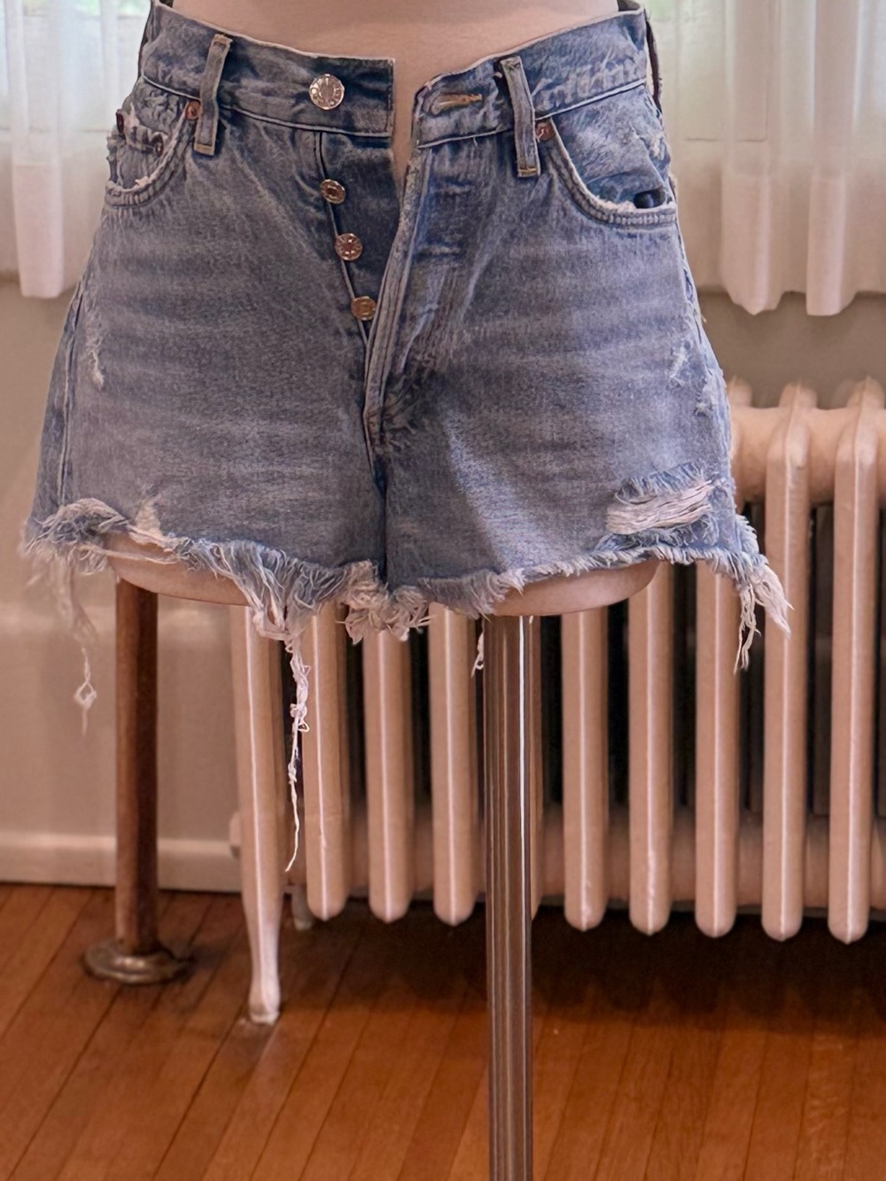 Agolde Light Blue Distressed Denim Cutoff Shorts